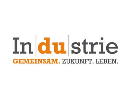 Logo der Industrie mit dem Slogan „Gemeinsam. Zukunft. Leben.“ in orange und grau.